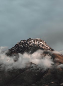 A captivating view of a cloud-covered Andes mountain peak in Atuntaqui, Ecuador.