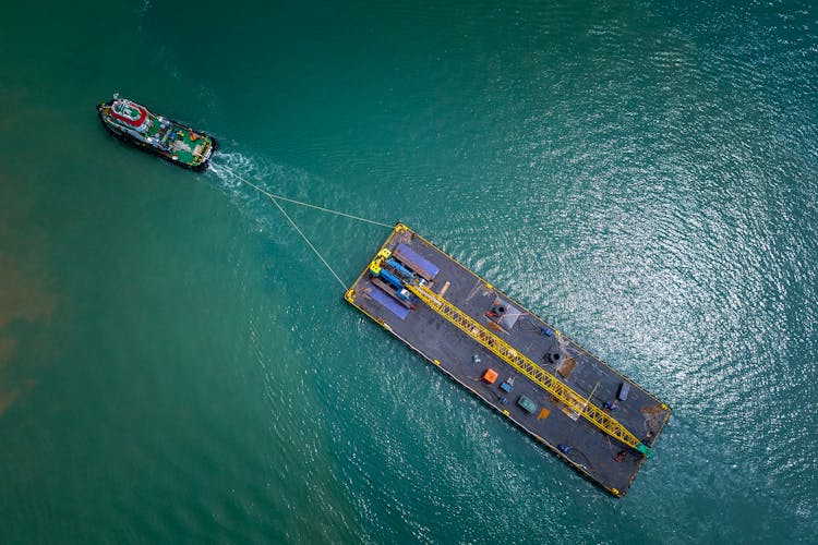 Ship With Cargo Floating In Sea