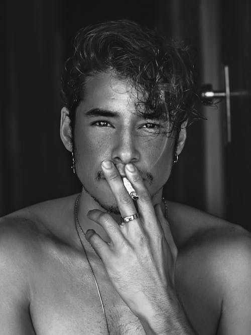 Shirtless Man Smoking