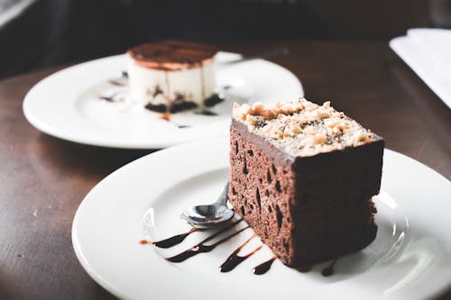 Free Chocolate Cake on White Ceramic Plate Stock Photo