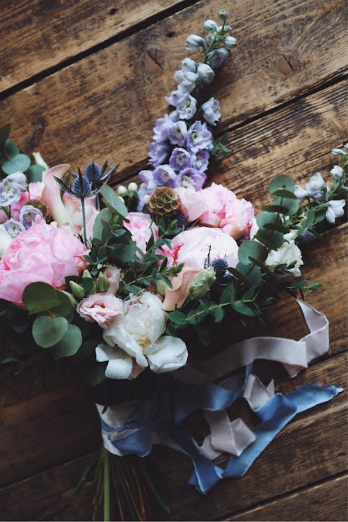 Free Flower Bouquet on Wooden Surface Stock Photo