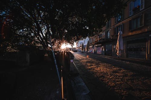 Free Empty street in old city district at dawn Stock Photo