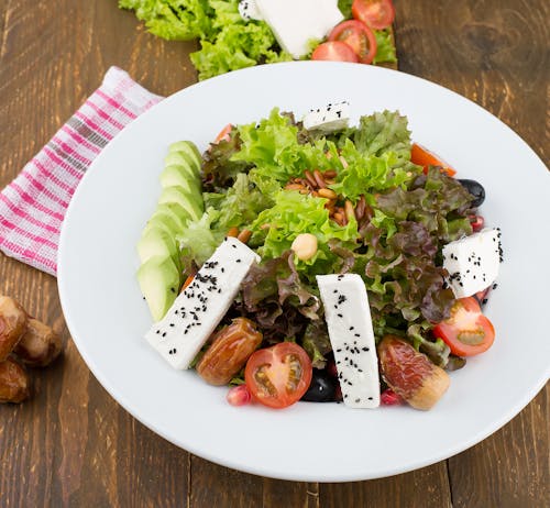 Free Vegetable Salad on White Ceramic Plate Stock Photo