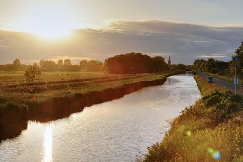 Безкоштовне стокове фото на тему «rivier, zonsondergang»