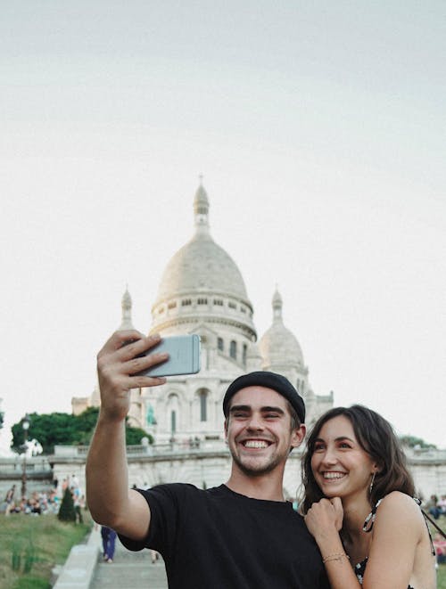 Man in Black Crew Neck Shirt Beside Woman