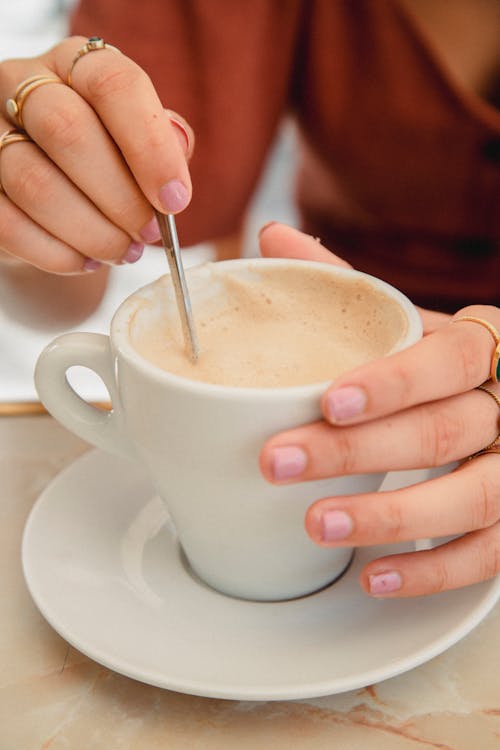 Free Person Holding White Ceramic Mug With Coffee Stock Photo