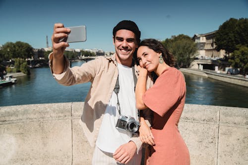 Free Man and Woman Taking a Selfie Stock Photo