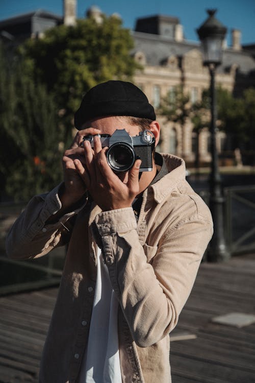 Foto profissional grátis de câmera, desgaste, fotógrafo