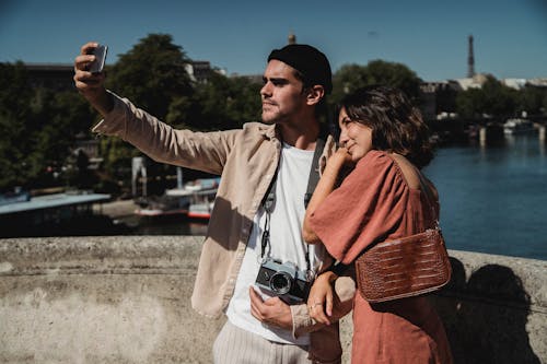 Free Man and Woman Taking Photos Together Stock Photo