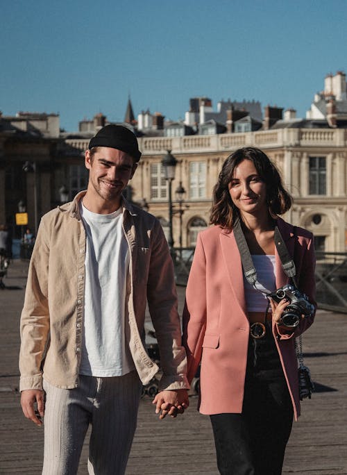 Free Man and Woman Holding Hands Stock Photo