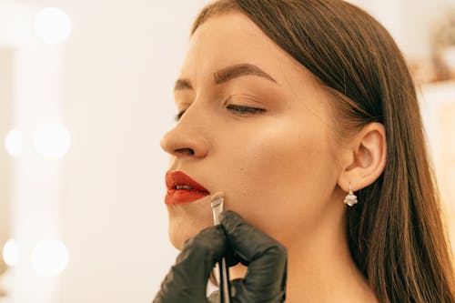 Woman Wearing Red Lipstick 