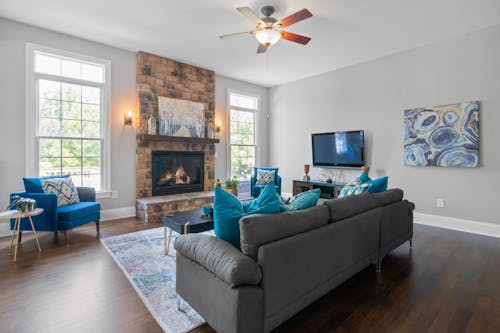 Blue Armchairs and Gray Sofa in a Living Room