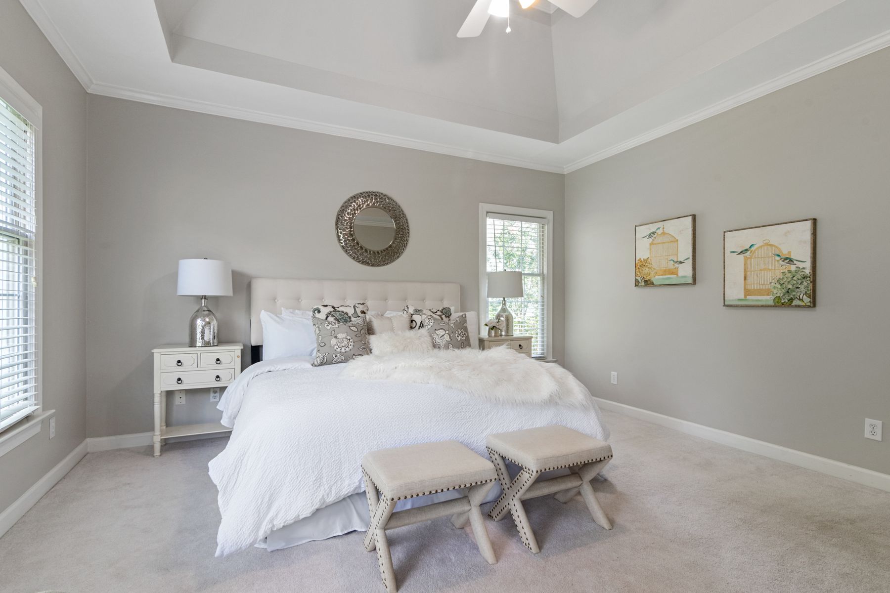 Minimal bedroom with white bed linen and soft neutral decor