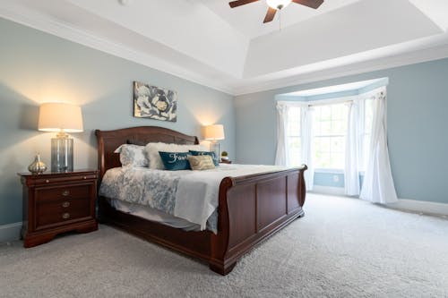 Brown Wooden Bed Frame in a Bedroom