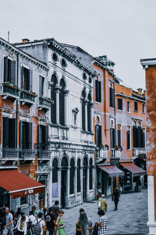 Free Exterior of classic buildings with balconies and shabby walls on pavement street of city Stock Photo