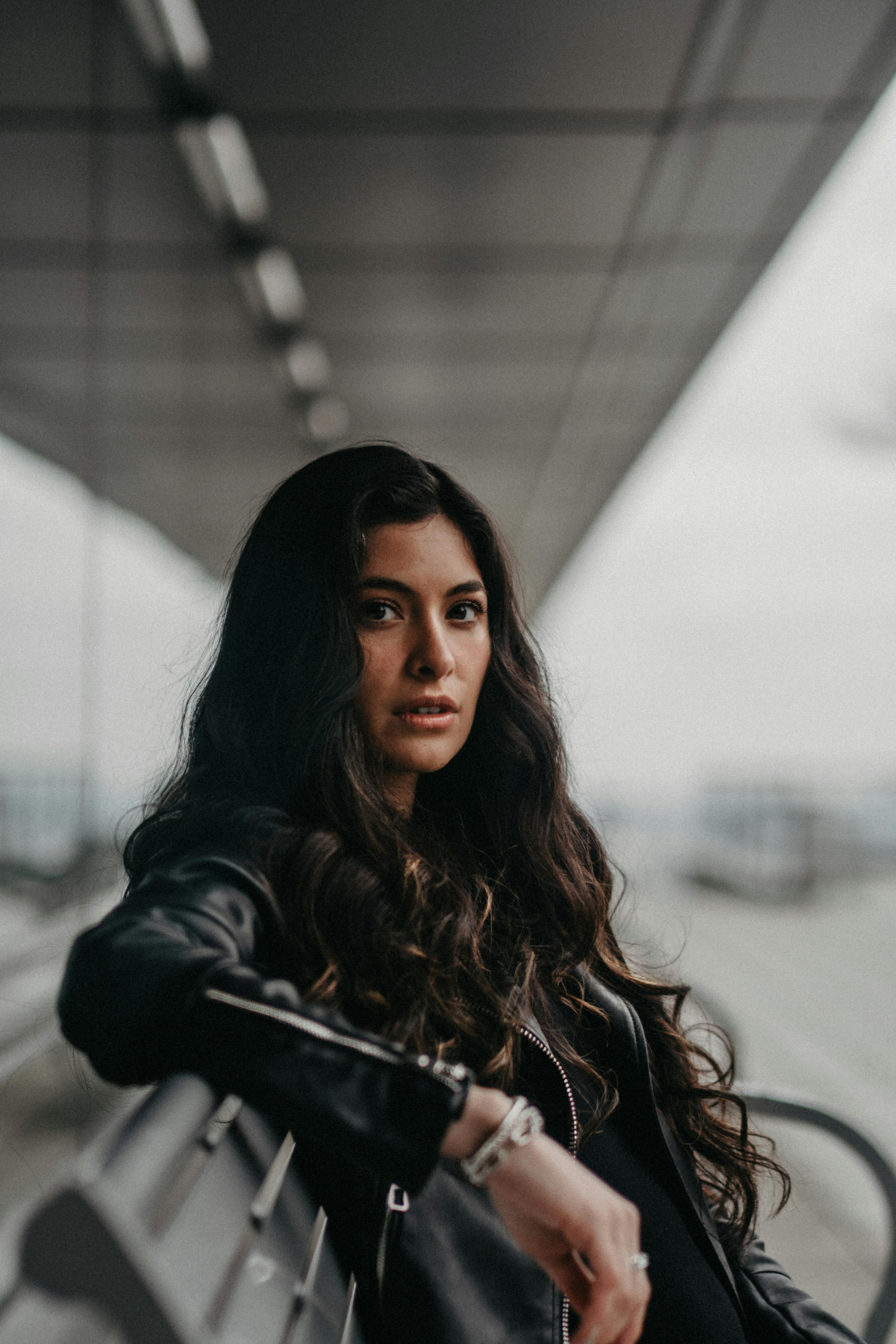 woman in black leather jacket