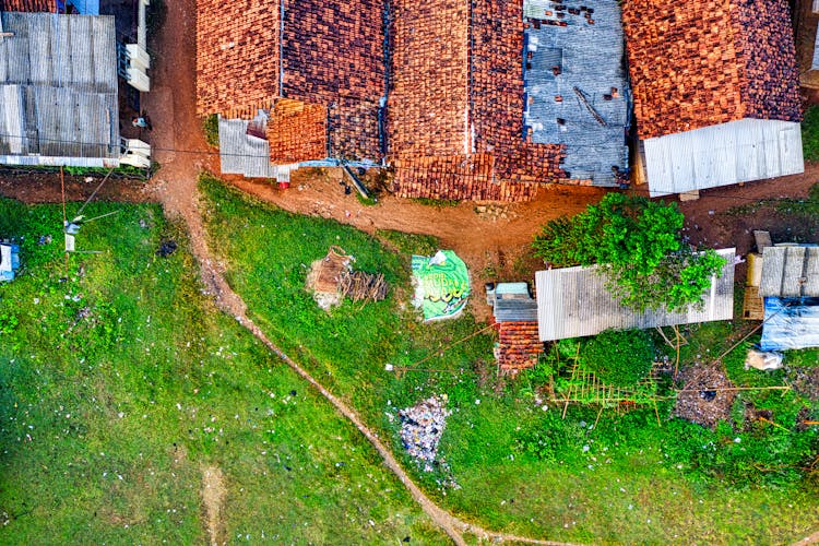 Drone Shot Of Houses With Tile Roofs