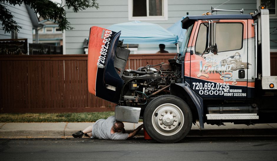man blocking truck driveway
