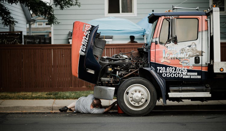 Man Under A Truck