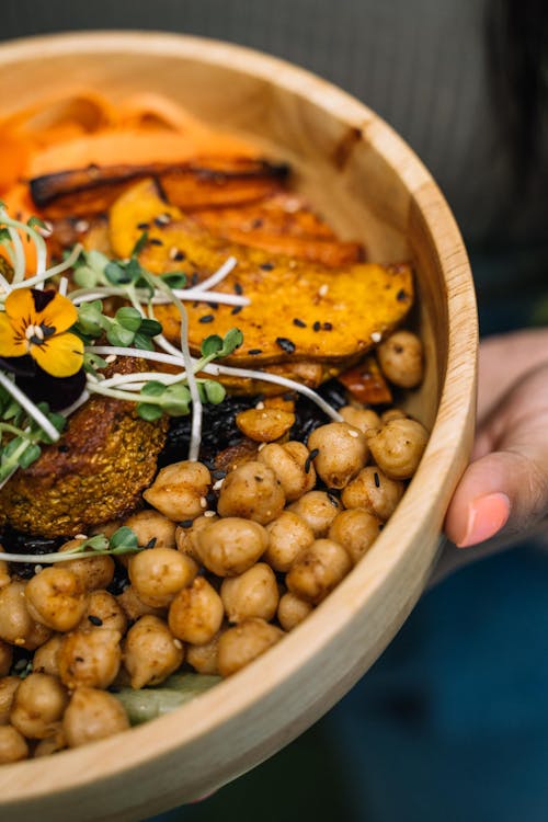 Free Person Holding Brown Wooden Bowl With Cooked Food Stock Photo