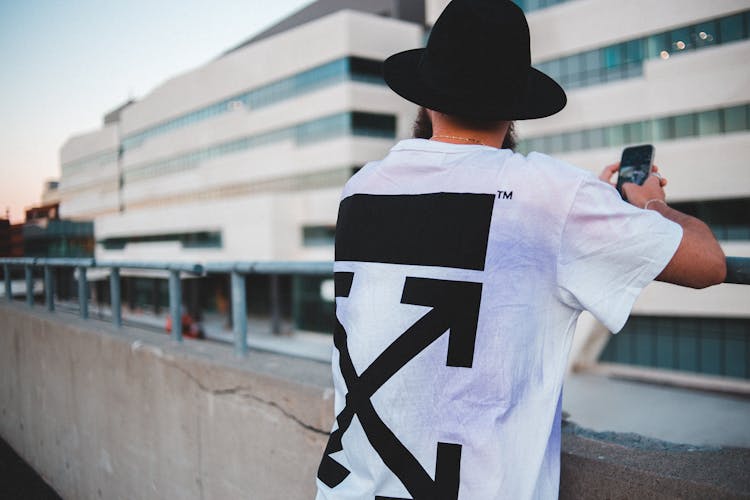 Stylish Man In Hat With Smartphone