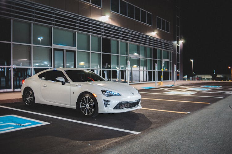 Modern Car Parked Near Building