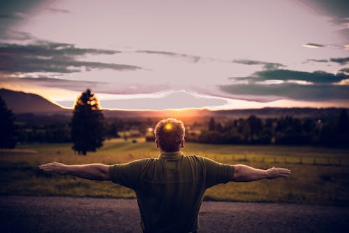 Free Person Standing Open Arms Stock Photo