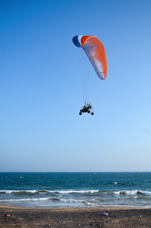 Person Riding a Parachute