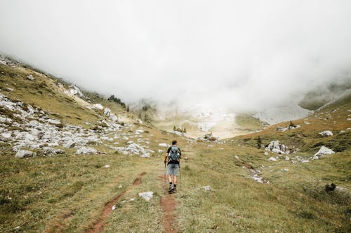 Free Person Carrying a Bag Hiking Stock Photo