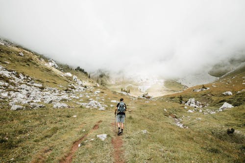 Person Carrying a Bag Hiking