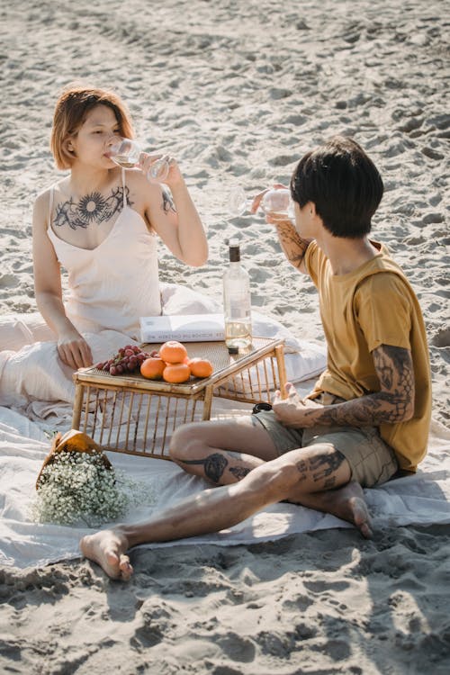 People Having a Picnic at the Beach