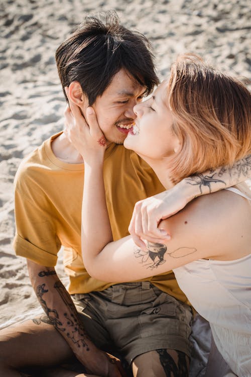 Free Man and Woman at the Beach Stock Photo