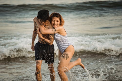 Man and Woman Enjoying the Beach