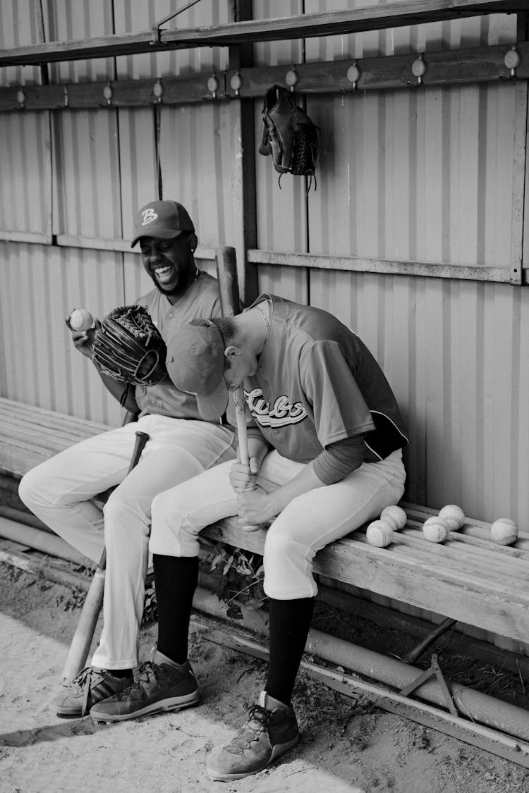 Baseball Players Sitting On A Bench