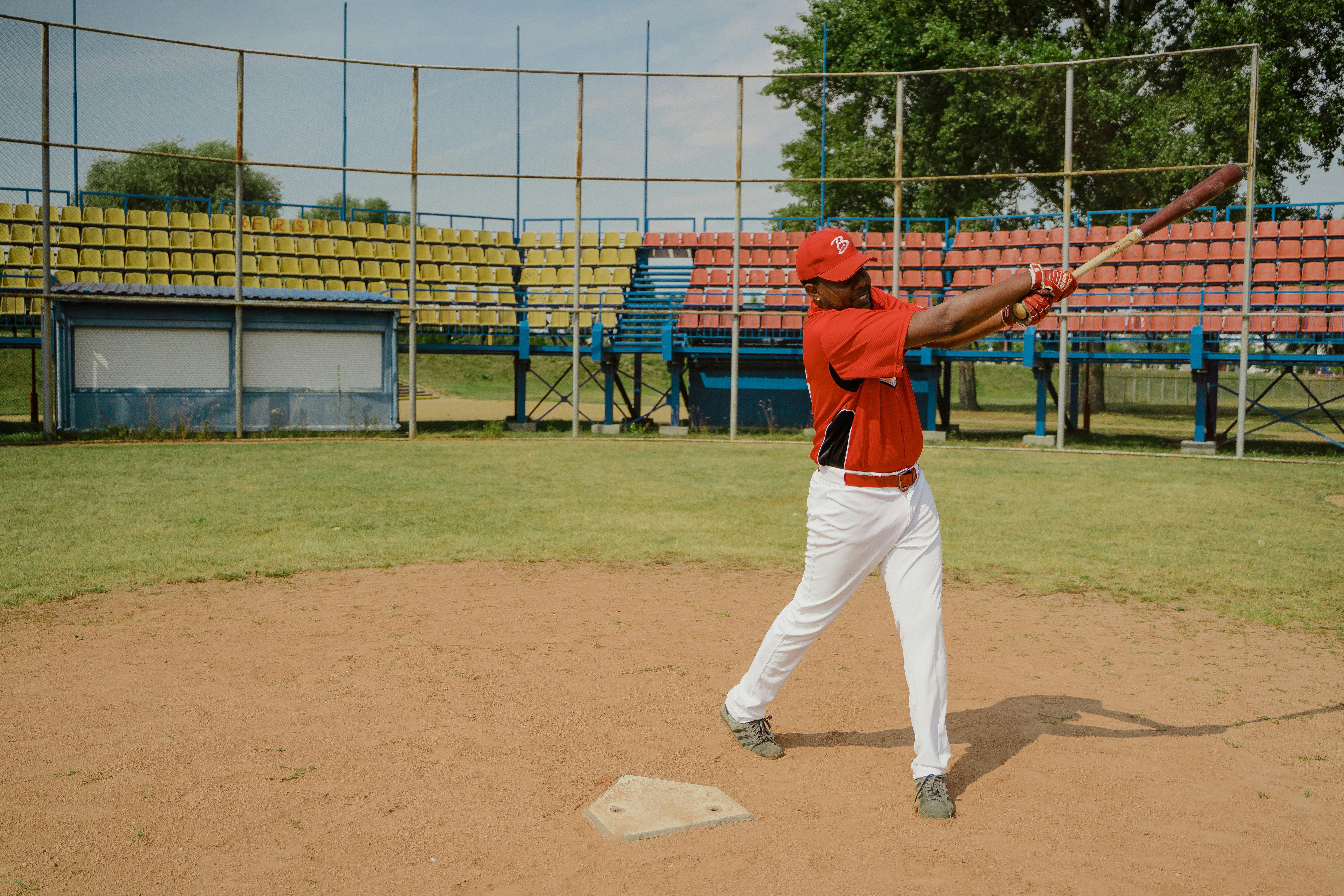 man swaying a baseball bat