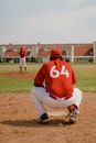 Catcher in Red Jersey Waiting for the Ball