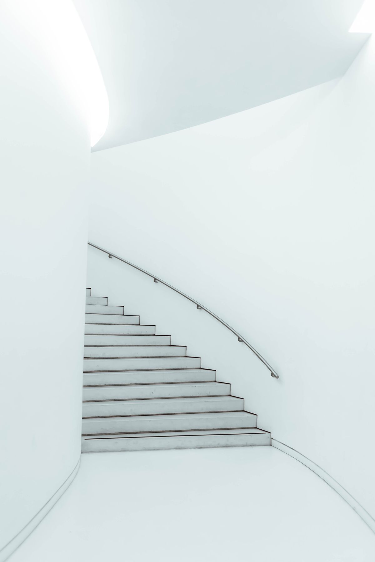 Concrete stairs in a modern building — there is no elevator to the top