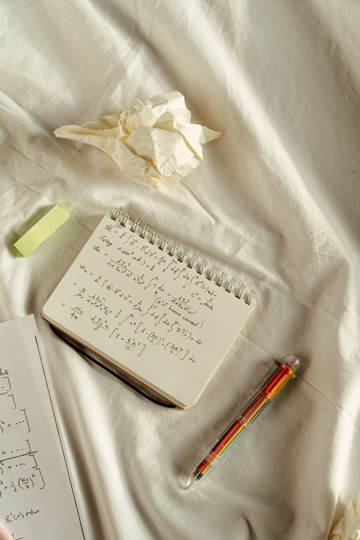 Notebook with handwritten formulas