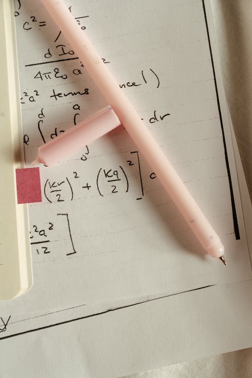 Free Pink Pen on White Paper Stock Photo