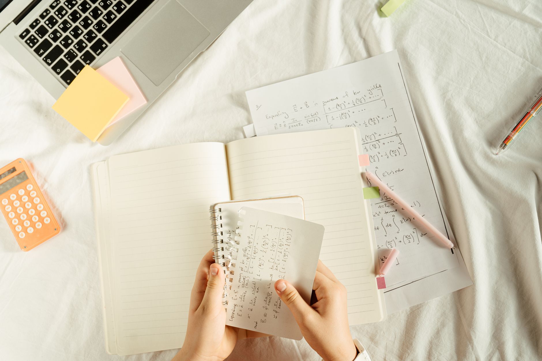 Notebook with handwritten equations