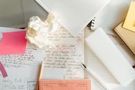 Corrections on a Paragraph Written on a Paper Beside Crumpled Paper