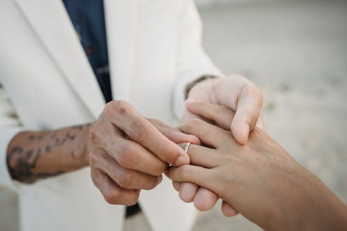 Free Putting Engagement Ring on Hand Stock Photo