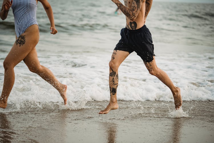 People Running In Water