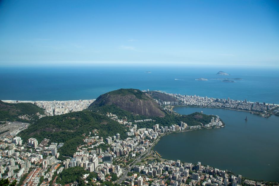 Amazing Private 45 min Helicopter Tour in Rio de Janeiro for 3 people Review Review 2026 - Stunning aerial image capturing Rio de Janeiro's coastline, showcasing mountains, city, and ocean.
