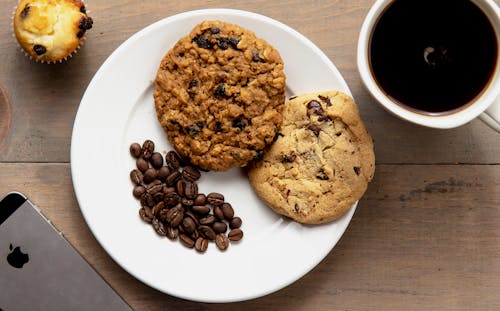Free Cookies on White Plate and Coffee Stock Photo