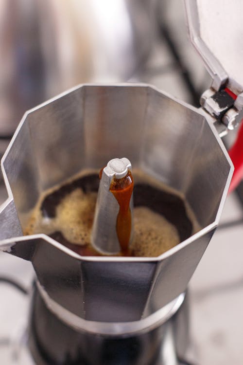 Free Brewing Coffee on Moka Pot Stock Photo