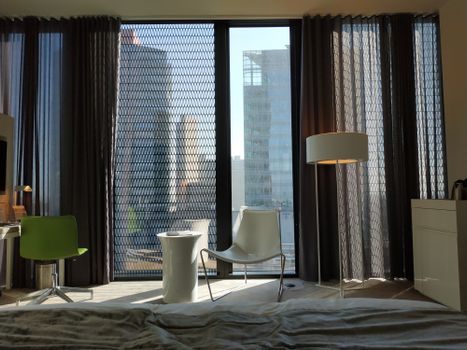 White and Gray Chair Near Window