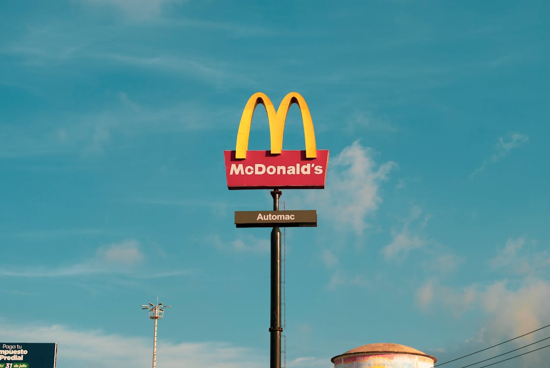 Free Blue Sky over a McDonald's Sign Stock Photo