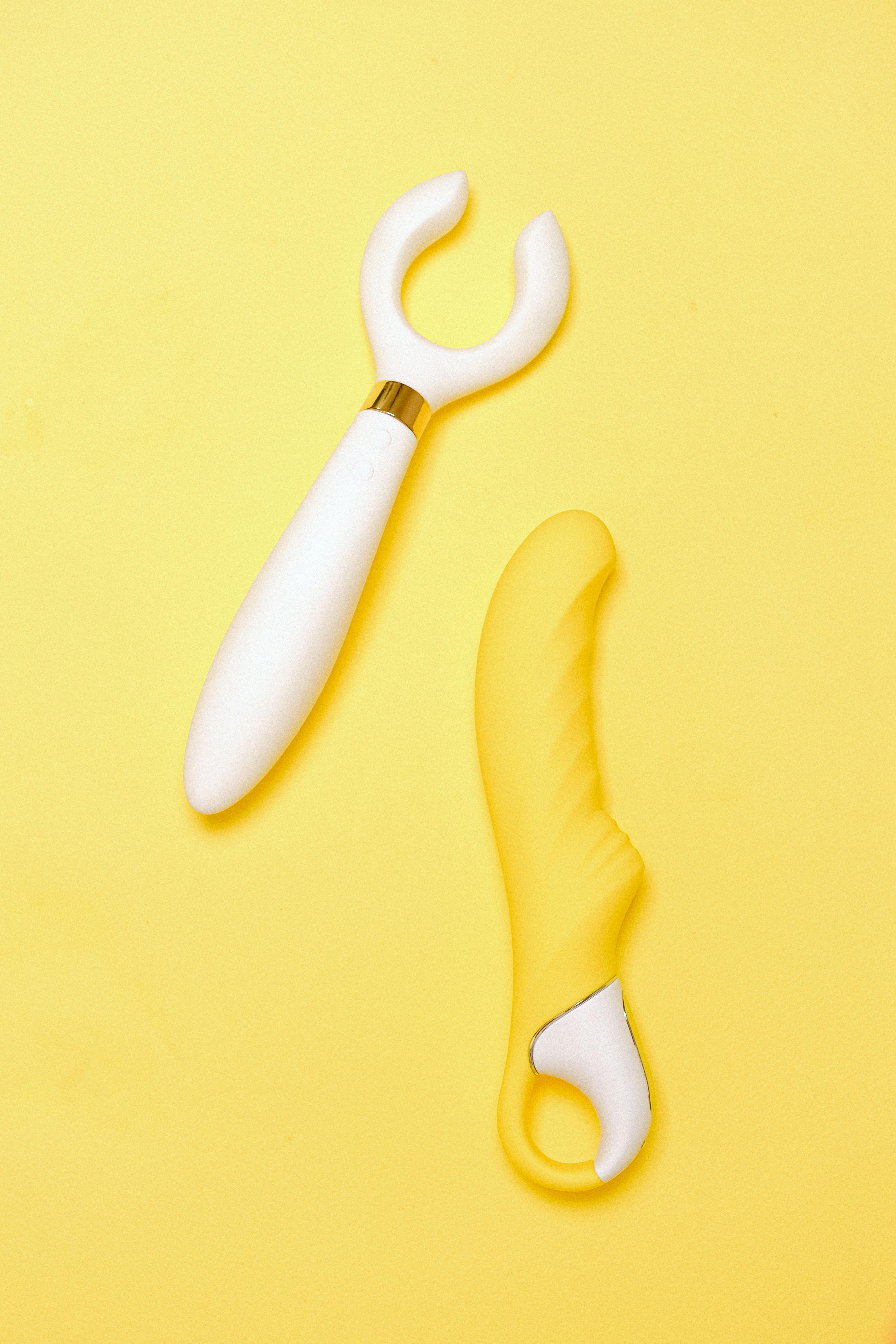 sex toys on a yellow background