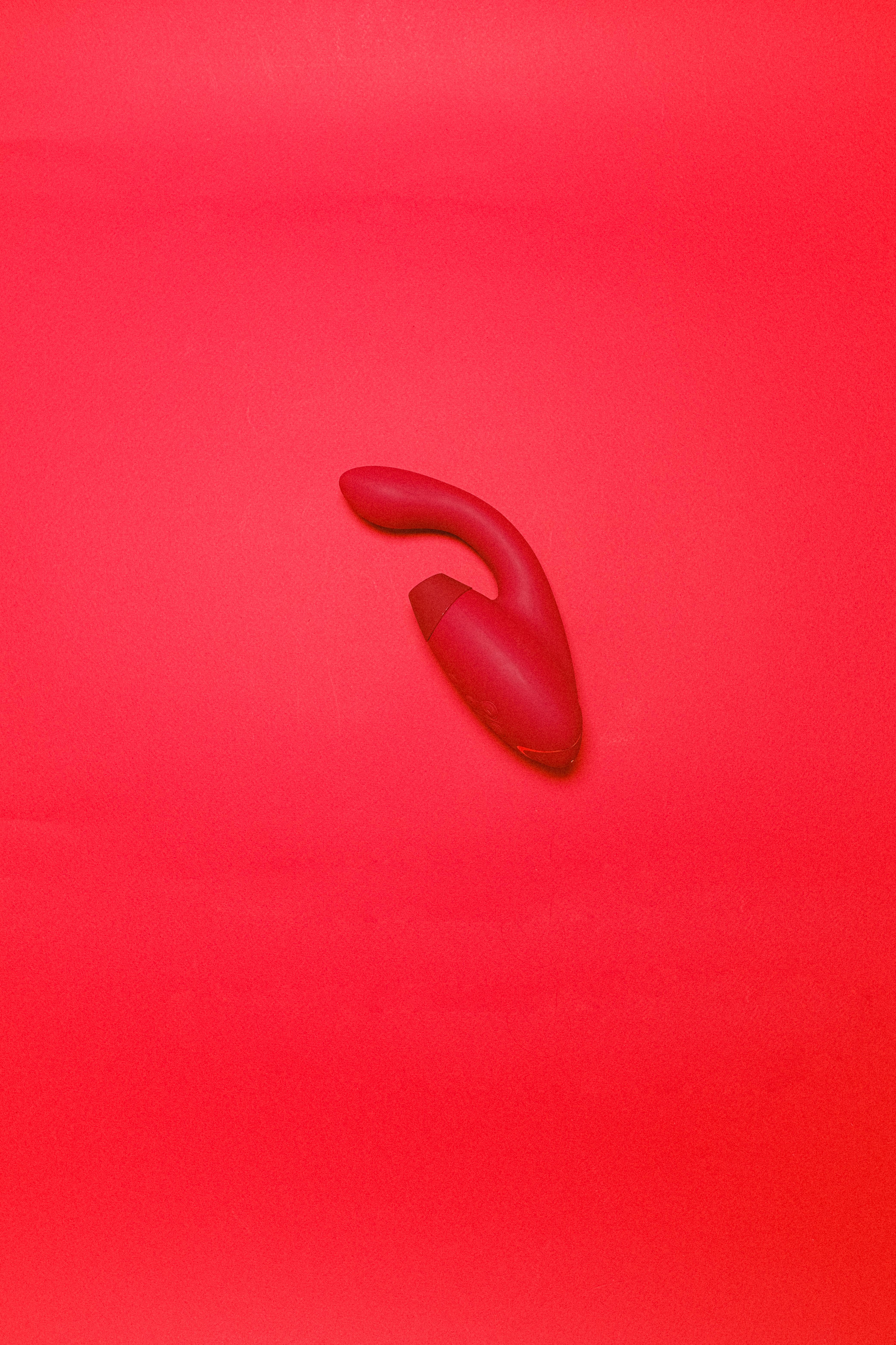 sex toy on a red background